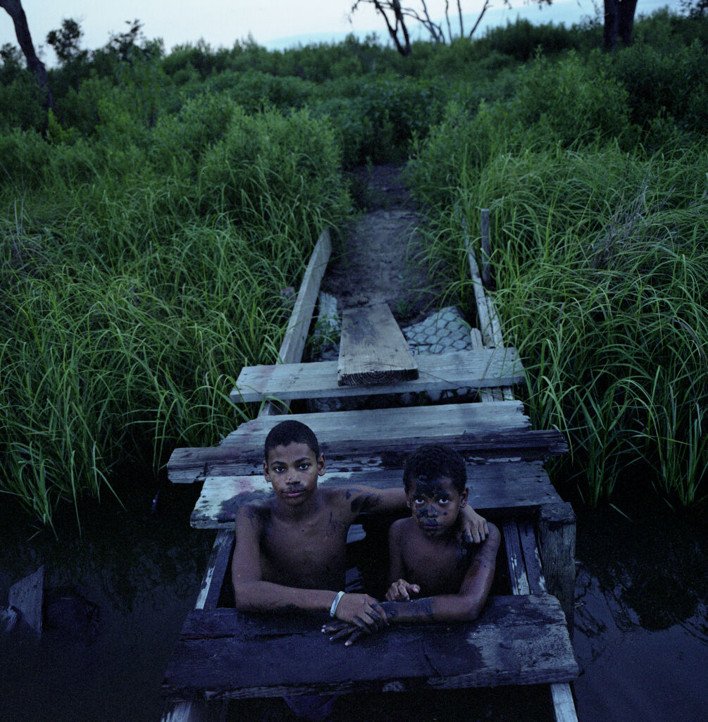 Joseph and Jasmon Jackson Play in the Bayou, Isle de Jean Charles, Louisiana