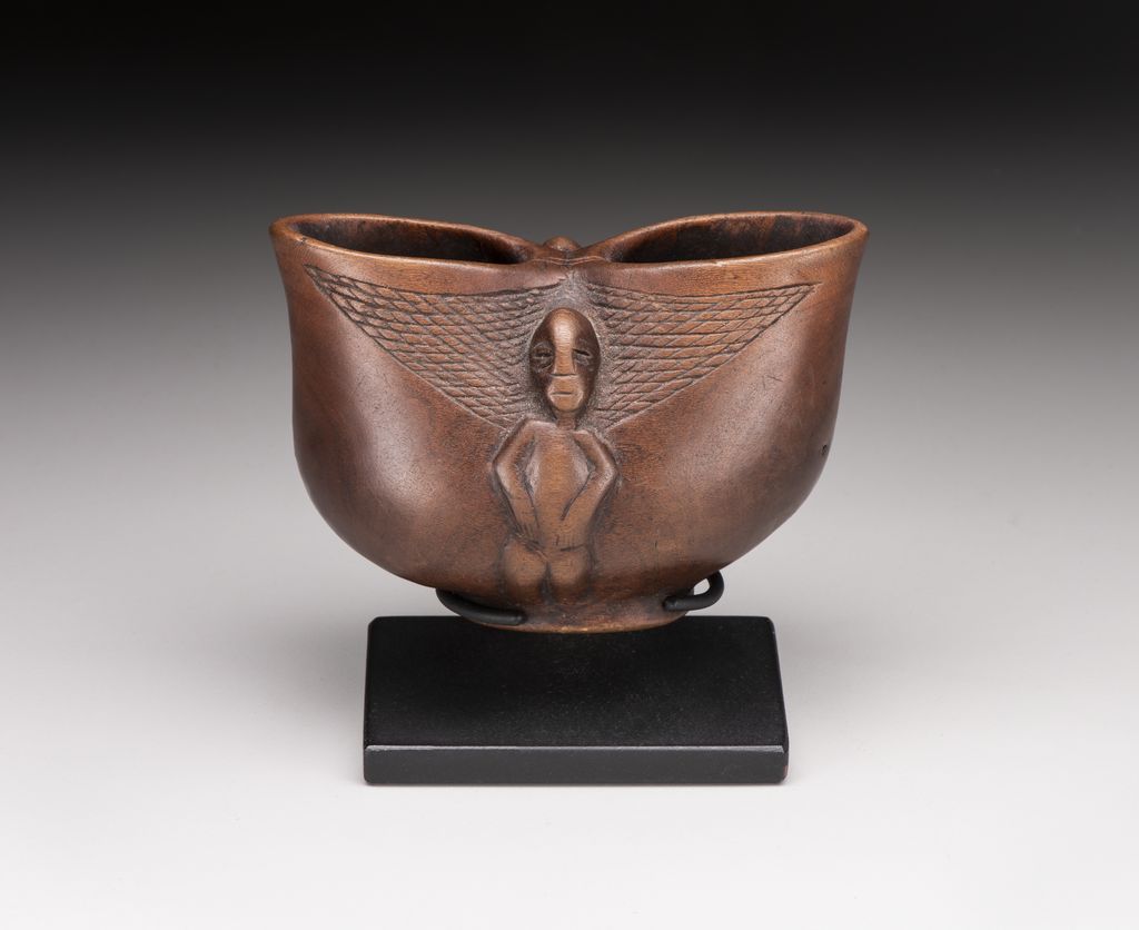 Cup with Figure in Relief and Geometric design