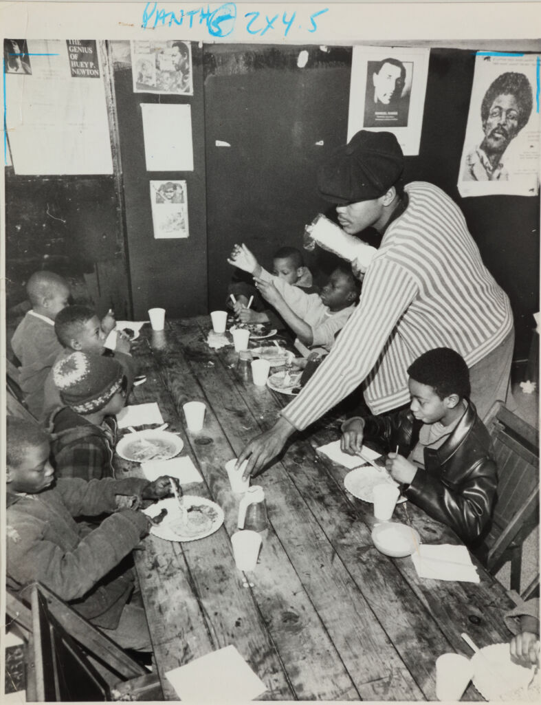 Black Panthers organization helps serve breakfast to youngsters in a Philadelphia headquarters