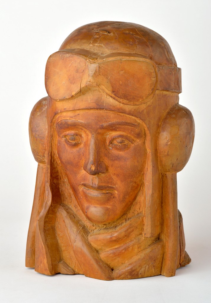 American carved wooden head bust portrait depicting aviator Amelia Earhart