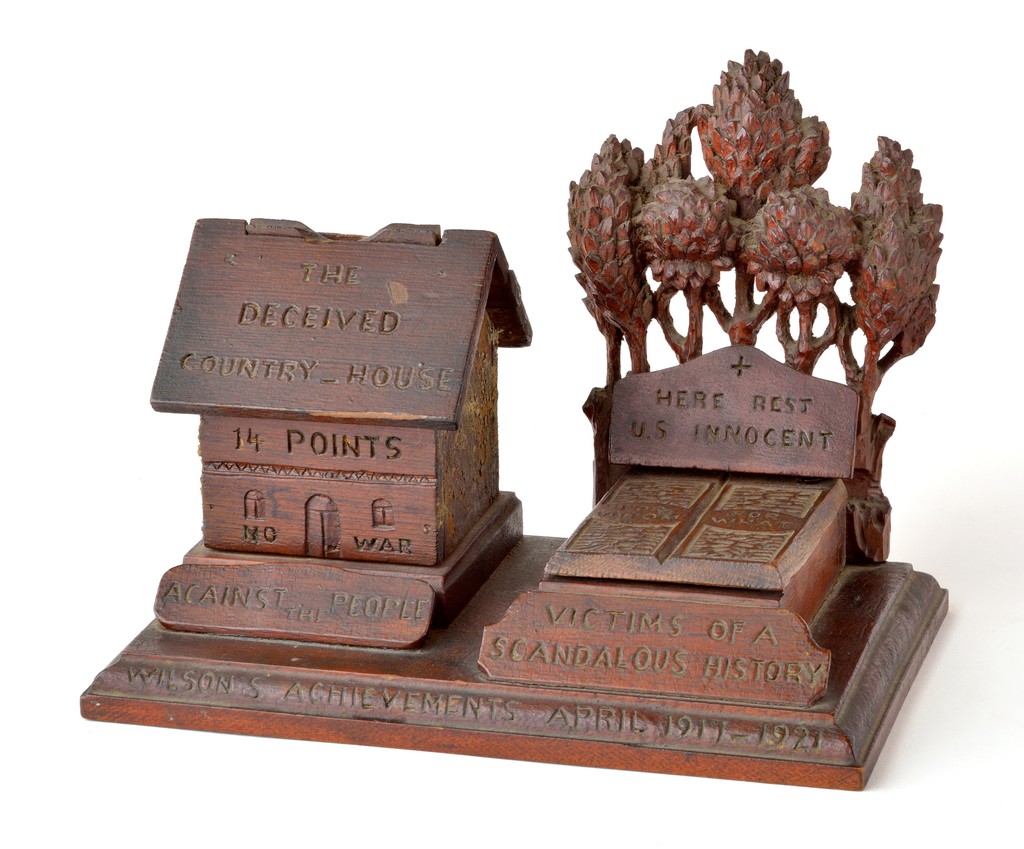 Match box dispenser in the form of a house and grave featuring statements against Woodrow Wilson and the League of Nations