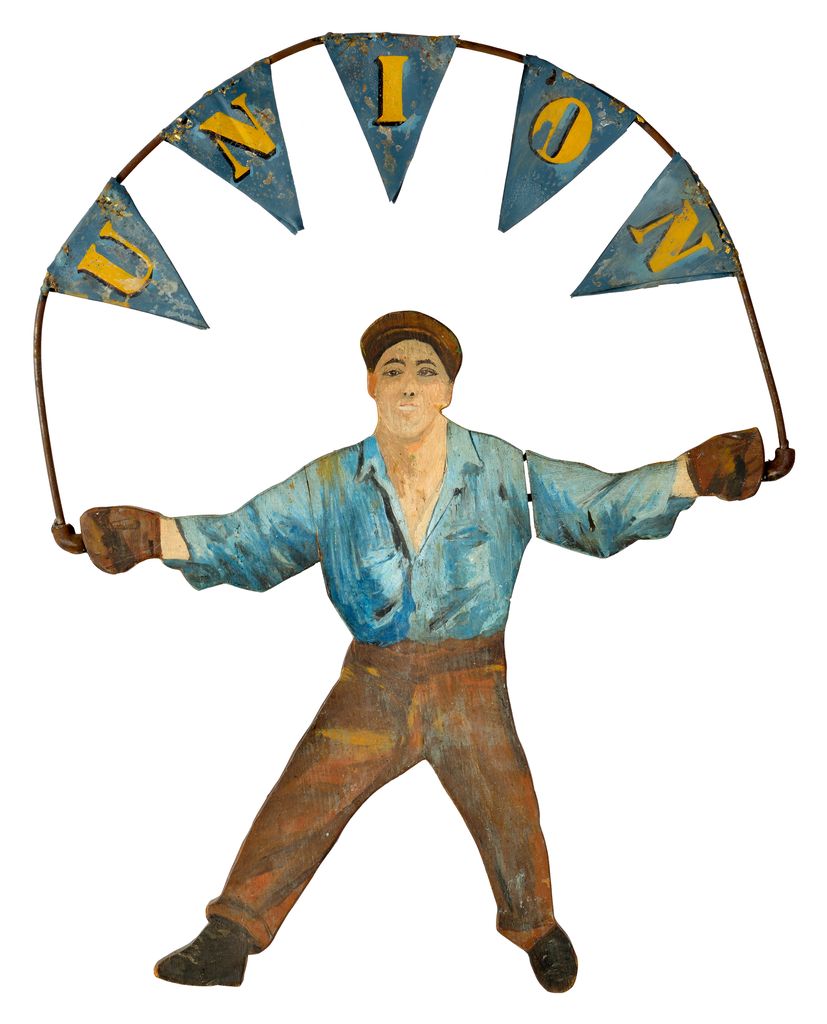 American polychrome carved wooden sign depicting standing man holding metal pennants on metal frame spelling out UNION for use at union meetings