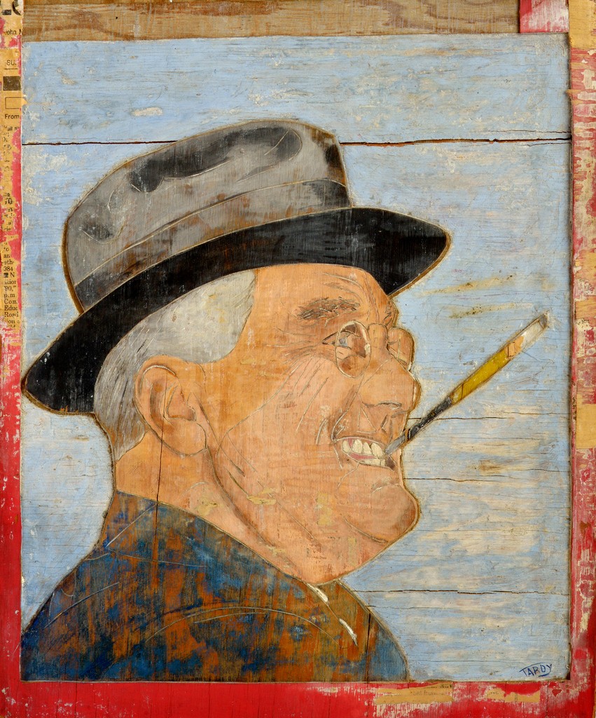Franklin Delano Roosevelt with cigarette holder in clenched teeth