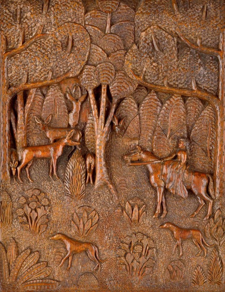 American relief carved wooden plaque depicting woman riding horses in woods with dogs, deer, and trees in background, inscribed “carved in Broodus Montana by Ed Gring for Harold Garr”