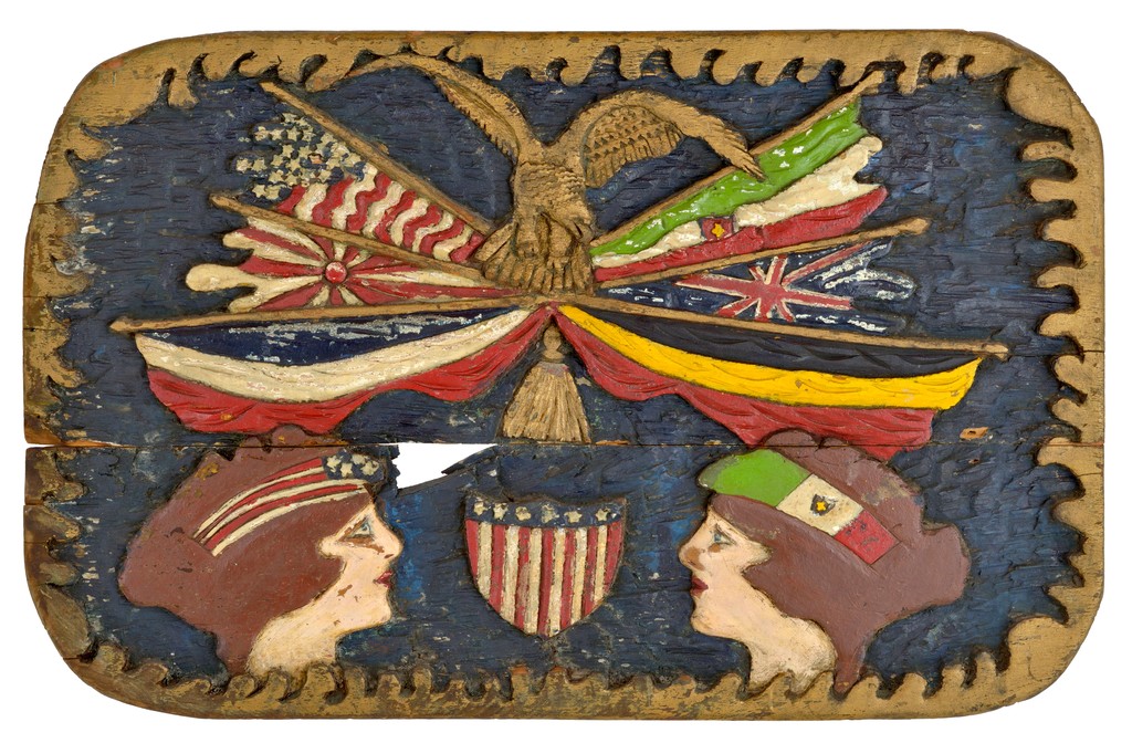 American polychrome carved wooden plaque depicting Lady Liberty facing Italia having eagle and flags of nations above with American shield between them and gilt surround