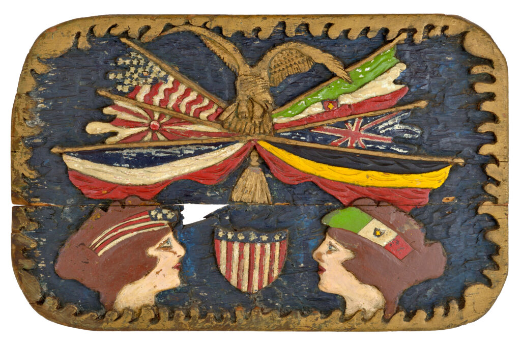 American polychrome carved wooden plaque depicting Lady Liberty facing Italia having eagle and flags of nations above with American shield between them and gilt surround