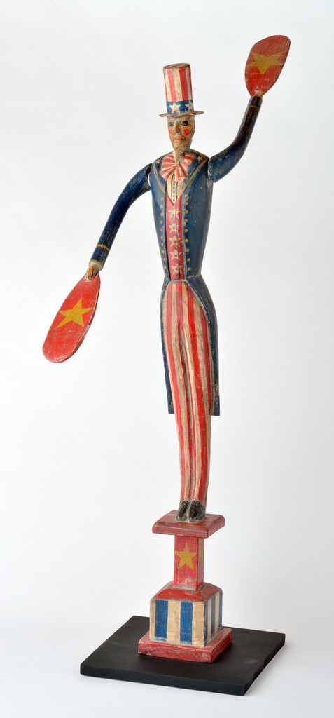 American polychrome carved Uncle Sam whirligig on circus style stepped pedestal