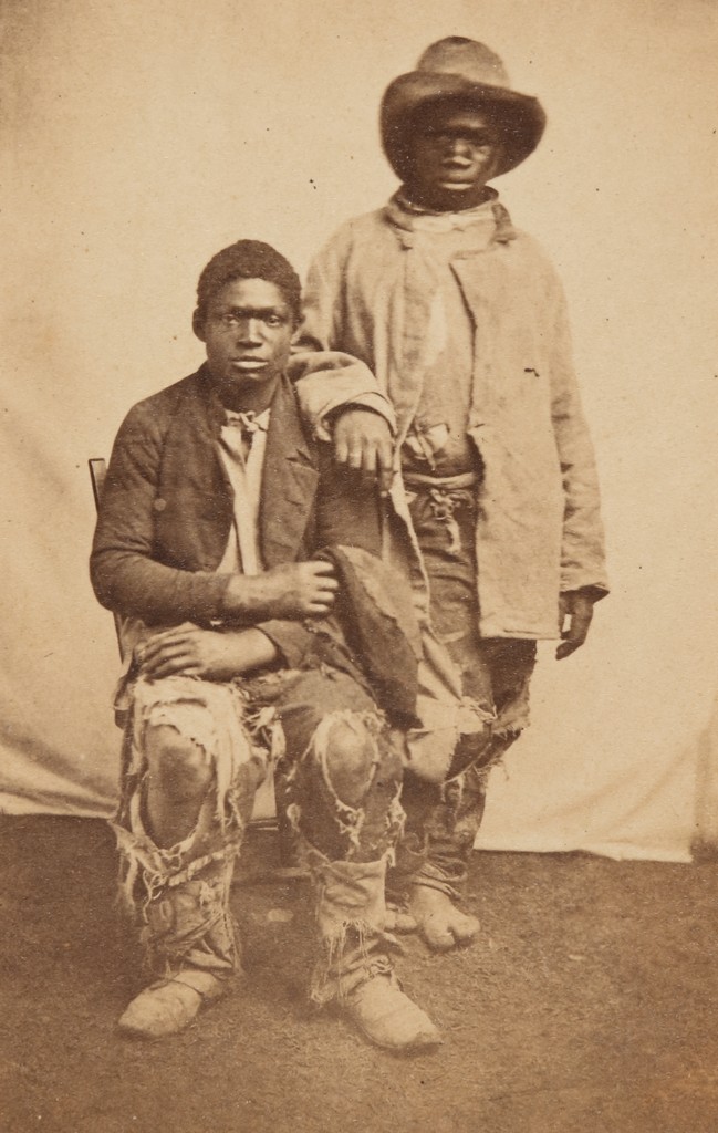 Two African American Young Men in Tattered Clothing