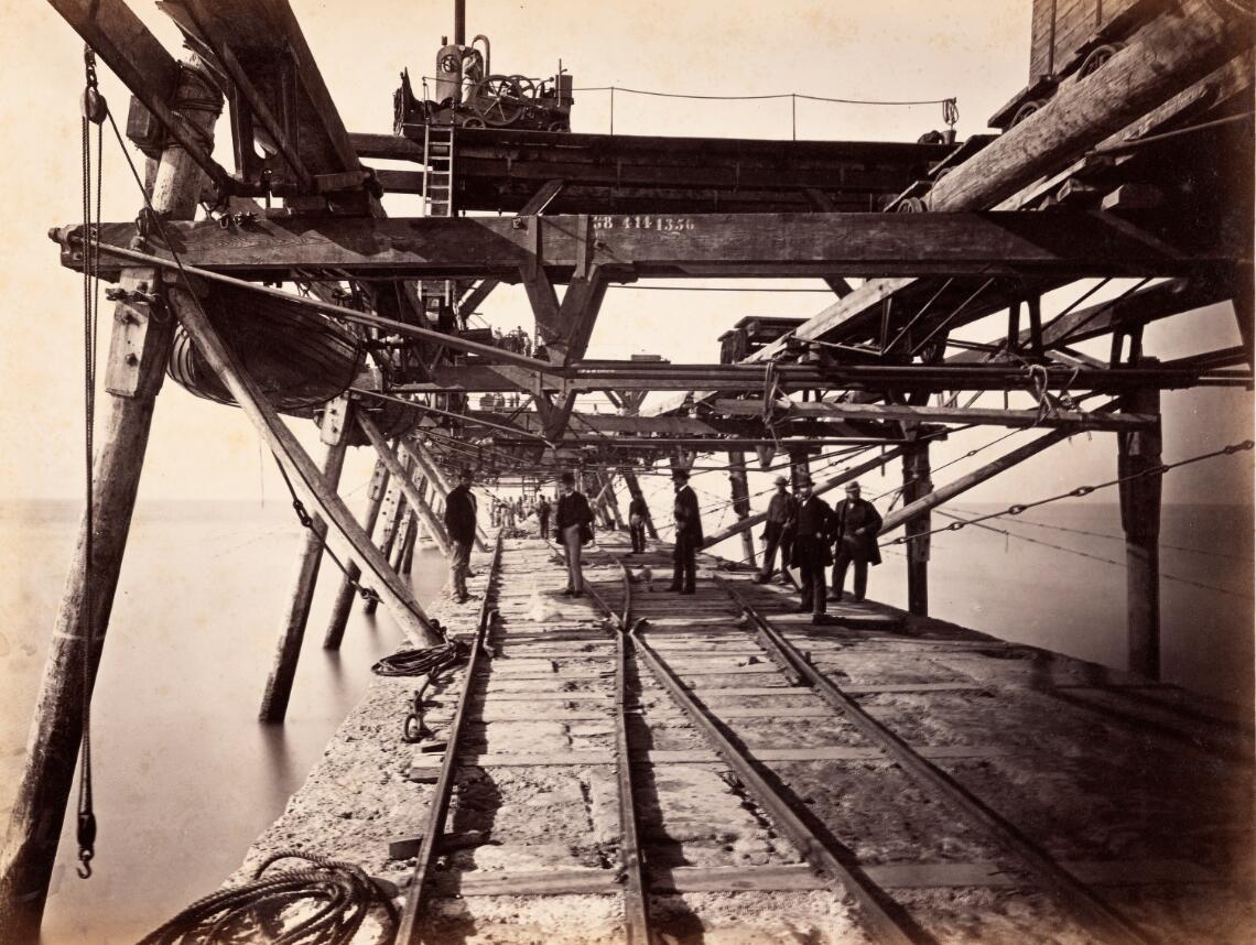 Noordelijk havenhoofd met werksteiger (1869)